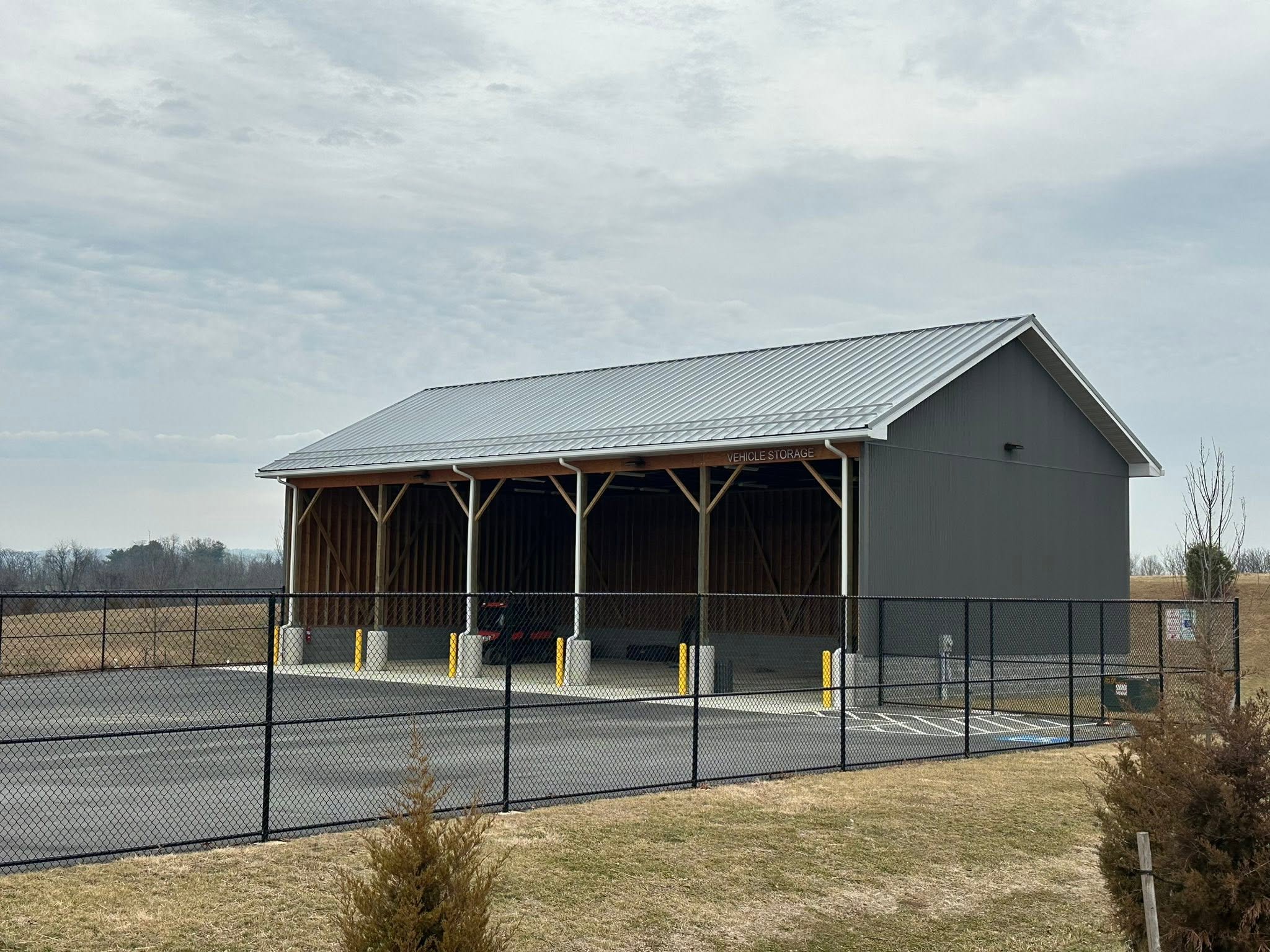 Agricultural farm building with fenced paddock built in Maryland