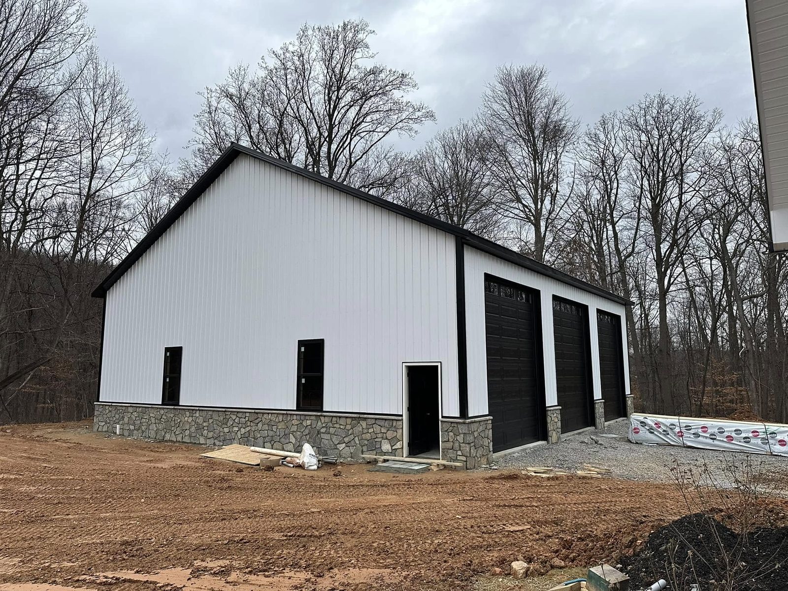 Cape-style detached garage with dormers and vinyl siding in Mount Airy, Maryland