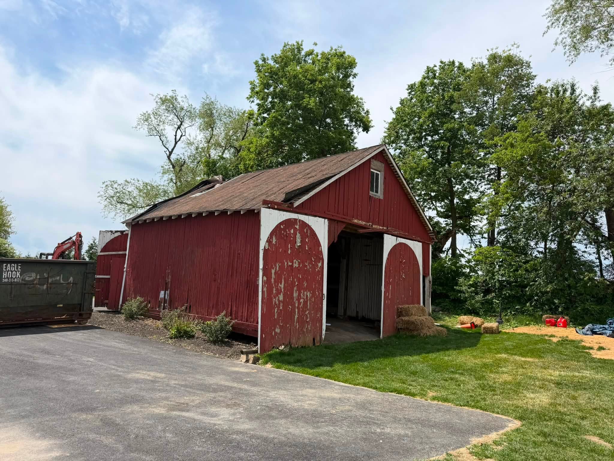Equestrian run-in shelter with horse trailers on a Maryland farm
