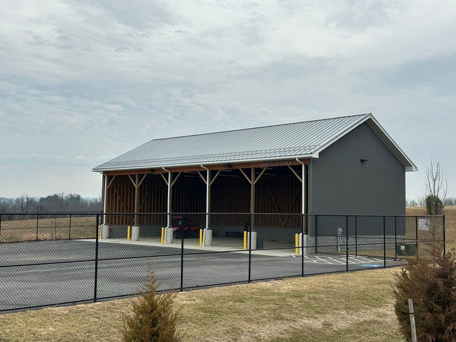 White and maroon post-frame building complex in Maryland
